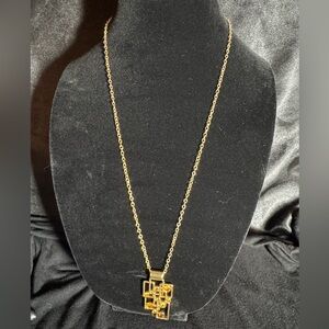 Lia Sophia Pendant On 37” Gold Tone Necklace Pendant embellishes with Crystals